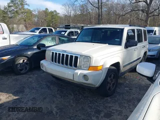 2010 Jeep Commander Sport with VIN 1J4RH4GK1AC122505, listed as a IAAI auction lot 41222229 with 244,001 mi miles and . Bid and sale history available at DreamBid. Image 2.