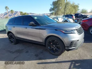 2020 Land Rover Range Rover Velar R-Dynamic S with VIN SALYK2EX7LA288847, listed as a IAAI auction lot 41108872 with 74,734 mi miles. Bid and sale history available at carsss.com. Image 1.