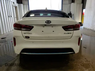 2020 Kia Optima Hybrid EX with VIN KNAGU4LE3L5041146, listed as a Copart auction lot 62423454 with 66,776 mi miles and Salvage Title. Bid and sale history available at carsss.com. Image 6.