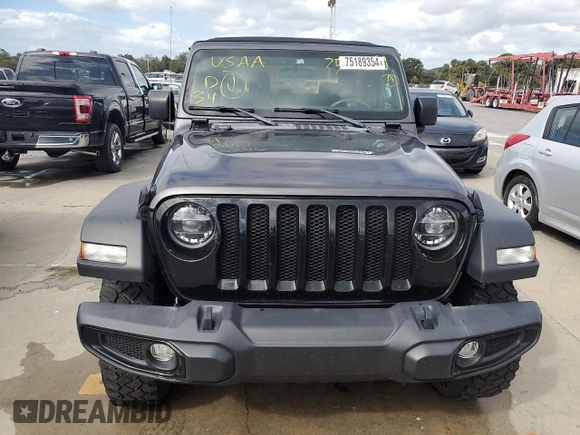 2021 Jeep Wrangler Sport with VIN 1C4GJXAG0MW571359, listed as a Copart auction lot 75189354 with 35,129 mi miles and Non Repairable. Bid and sale history available at DreamBid. Image 5.