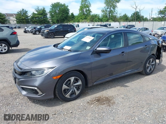 2021 Honda Civic LX with VIN 2HGFC2F65MH525423, listed as a IAAI auction lot 42319862 with 37,248 mi miles and . Bid and sale history available at DreamBid. Image 2.