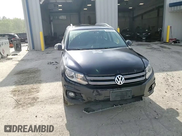 2013 Volkswagen Tiguan S with VIN WVGAV3AX1DW602083, listed as a Copart auction lot 57977515 with 114,375 mi miles and Clean title. Bid and sale history available at DreamBid. Image 14.