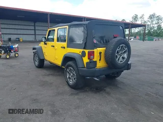 2015 Jeep Wrangler Unlimited Willys Wheeler with VIN 1C4BJWDG2FL643375, listed as a IAAI auction lot 42109724 with 112,357 mi miles and . Bid and sale history available at DreamBid. Image 3.
