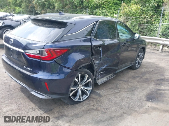 2017 Lexus RX 450h with VIN 2T2BGMCA8HC015536, listed as a IAAI auction lot 42130137 with 110,842 mi miles and . Bid and sale history available at DreamBid. Image 4.