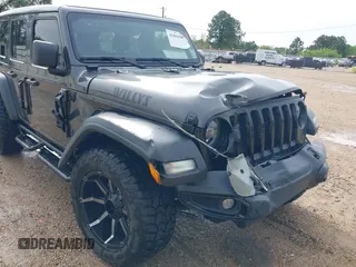 2021 Jeep Wrangler Unlimited Sport S with VIN 1C4HJXDG2MW700461, listed as a IAAI auction lot 41894307 with 82,454 mi miles. Bid and sale history available at carsss.com. Image 6.