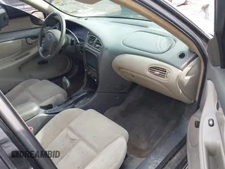 2004 Oldsmobile Alero GX z VIN 1G3NK52F44C107863, wystawiony jako IAAI lot #42018564 z przebiegiem 128 534 mil mil oraz . Historia ofert i sprzedaży dostępna na DreamBid. Obrazek 5.