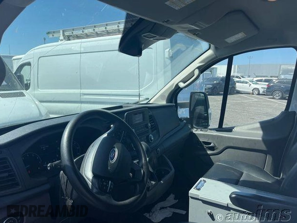 2020 Ford Transit Cargo z VIN 1FTBR1Y81LKB76529, wystawiony jako IAAI lot #42835283 z przebiegiem 131 910 mil mil oraz . Historia ofert i sprzedaży dostępna na DreamBid. Obrazek 6.