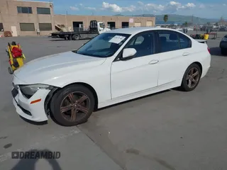 2014 BMW 3 Series 328i with VIN WBA3C1C54EK108518, listed as a IAAI auction lot 41872146 with 116,407 mi miles. Bid and sale history available at carsss.com. Image 2.