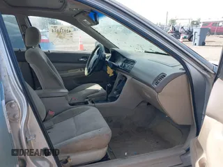 1996 Honda Accord EX w/Leather with VIN 1HGCD5666TA055580, listed as a IAAI auction lot 42021014 with 300,191 mi miles. Bid and sale history available at carsss.com. Image 5.