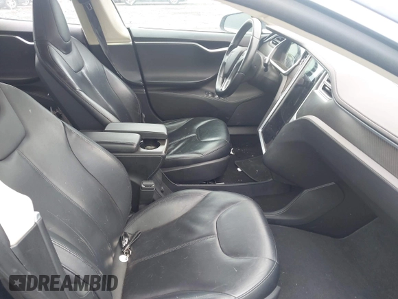 2014 Tesla Model S 60 with VIN 5YJSA1H19EFP32063, listed as a IAAI auction lot 42360872 with 103,495 mi miles and . Bid and sale history available at DreamBid. Image 5.