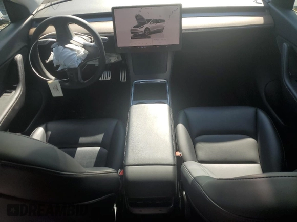 2022 Tesla Model Y Long Range with VIN 7SAYGDEE7NF408209, listed as a Copart auction lot 50469215 with 33,621 mi miles and Salvage Title. Bid and sale history available at carsss.com. Image 8.