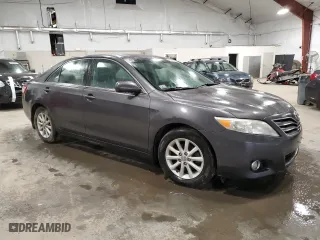2010 Toyota Camry with VIN 4T4BF3EK1AR052252, listed as a Copart auction lot 50243895 with 116,146 mi miles and Salvage Title. Bid and sale history available at carsss.com. Image 4.