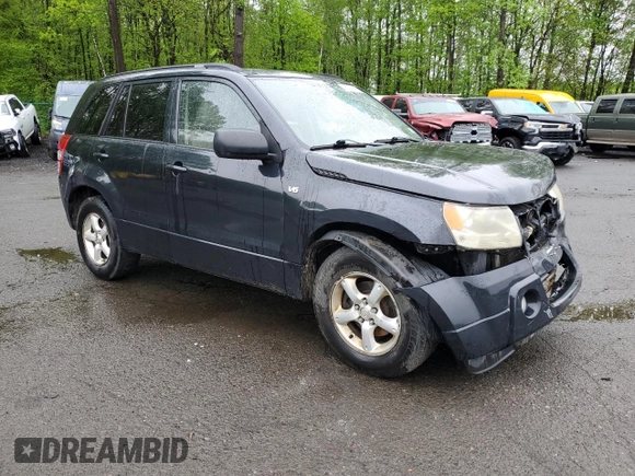 2006 Suzuki Grand Vitara Luxury with VIN JS3TD947364101307, listed as a Copart auction lot 55037585 with 198,616 mi miles and Salvage title. Bid and sale history available at DreamBid. Image 4.