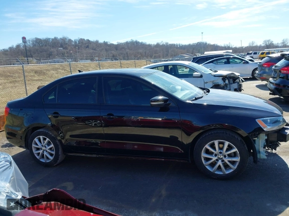 2012 Volkswagen Jetta Sedan SE w/Convenience with VIN 3VWDX7AJ4CM419447, listed as a IAAI auction lot 41653205 with 101,647 mi miles. Bid and sale history available at carsss.com. Image 13.