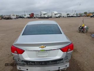 2014 Chevrolet Impala LT with VIN 2G1125S38E9102607, listed as a IAAI auction lot 41860235 with 128,599 mi miles and . Bid and sale history available at DreamBid. Image 17.