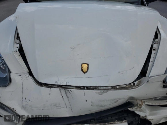 2012 Porsche Cayenne with VIN WP1AA2A23CLA02615, listed as a Copart auction lot 64604655 with 131,536 mi miles and Salvage title. Bid and sale history available at DreamBid. Image 12.