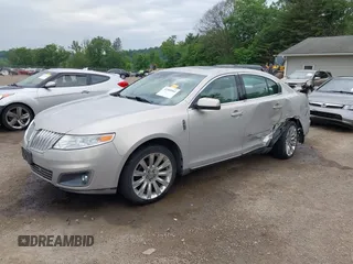2009 Lincoln MKS with VIN 1LNHM93R79G620964, listed as a IAAI auction lot 42385061 with 107,087 mi miles and . Bid and sale history available at DreamBid. Image 2.
