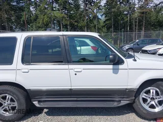 1998 Ford Explorer XL z VIN 1FMZU34E3WZA90831, wystawiony jako IAAI lot #42500120 z przebiegiem 97 799 mil mil oraz . Historia ofert i sprzedaży dostępna na DreamBid. Obrazek 12.