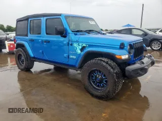 2023 Jeep Wrangler Sahara with VIN 1C4HJXEG7PW590252, listed as a Copart auction lot 59377765 with 32,689 mi miles and Salvage title. Bid and sale history available at DreamBid. Image 4.
