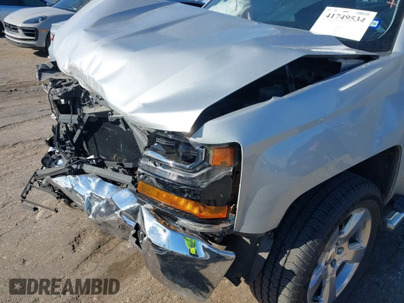 2018 Chevrolet Silverado 1500 LT with VIN 1GCRCREC0JZ212383, listed as a IAAI auction lot 41749534 with 45,777 mi miles and . Bid and sale history available at DreamBid. Image 6.