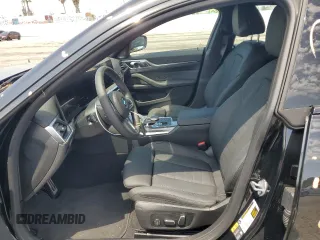 2024 BMW i4 M50 with VIN WBY33AW09RFS37404, listed as a Copart auction lot 51594984 with 776 mi miles and Salvage Title. Bid and sale history available at carsss.com. Image 7.