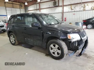 2012 Suzuki Grand Vitara Premium z VIN JS3TD0D66C4100814, wystawiony jako Copart lot #89250025 z przebiegiem 102 381 mil mil oraz Szkody całkowita. Historia ofert i sprzedaży dostępna na DreamBid. Obrazek 4.