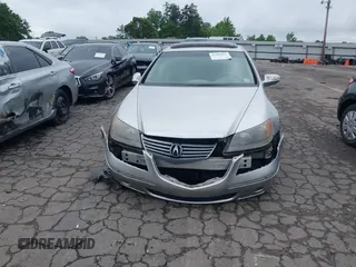 2005 Acura RL z VIN JH4KB16595C017766, wystawiony jako IAAI lot #42209022 z przebiegiem 225 862 mil mil oraz . Historia ofert i sprzedaży dostępna na DreamBid. Obrazek 12.