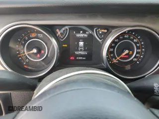 2023 Jeep Wrangler Willys with VIN 1C4HJXDN0PW631045, listed as a Copart auction lot 60109565 with 31,095 mi miles and Salvage title. Bid and sale history available at DreamBid. Image 9.