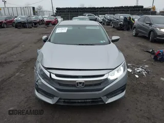 2018 Honda Civic LX with VIN 2HGFC2F56JH585343, listed as a IAAI auction lot 41558691 with 123,838 mi miles. Bid and sale history available at carsss.com. Image 13.