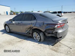 2024 Toyota Camry LE z VIN 4T1R11AK2RU216038, wystawiony jako Copart lot #56582725 z przebiegiem 42 623 mil mil oraz Szkoda całkowita • Salvage title. Historia ofert i sprzedaży dostępna na DreamBid. Obrazek 2.