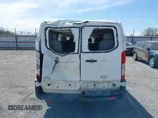 2015 Ford Transit XL z VIN 1FBZX2ZM4FKA31645, wystawiony jako IAAI lot #41845494 z przebiegiem 204 890 mil mil oraz . Historia ofert i sprzedaży dostępna na DreamBid. Obrazek 16.