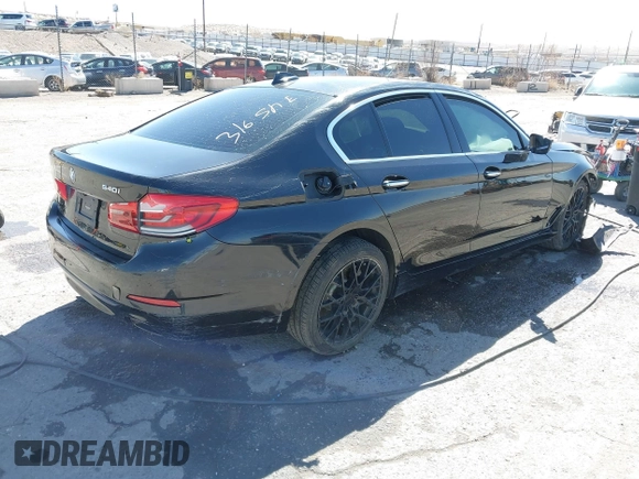 2018 BMW 5 Series 540i with VIN WBAJE5C52JWA97999, listed as a IAAI auction lot 41763708 with Not Provided miles and . Bid and sale history available at carsss.com. Image 4.