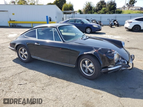 1971 Porsche 911 with VIN 9111120590, listed as a Copart auction lot 52559665 with 44,582 mi miles and Salvage title. Bid and sale history available at DreamBid. Image 4.