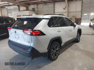 2023 Toyota RAV4 Hybrid XLE Premium with VIN JTMB6RFV2PD089104, listed as a IAAI auction lot 42645439 with 43,535 mi miles and . Bid and sale history available at DreamBid. Image 4.