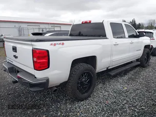 2017 Chevrolet Silverado 1500 LT with VIN 1GCUKREC1HF135337, listed as a IAAI auction lot 41267713 with 114,417 mi miles and . Bid and sale history available at DreamBid. Image 4.