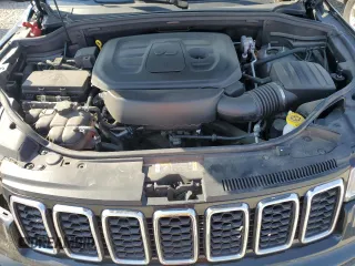 2022 Jeep Grand Cherokee WK Laredo E with VIN 1C4RJFAG2NC112887, listed as a Copart auction lot 77733094 with 51,850 mi miles and Salvage Title. Bid and sale history available at carsss.com. Image 12.