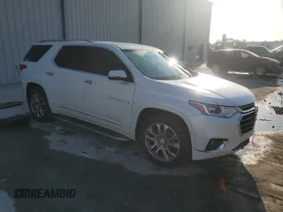2018 Chevrolet Traverse Premier with VIN 1GNERKKW4JJ242477, listed as a Copart auction lot 50453125 with 133,698 mi miles and Salvage Title. Bid and sale history available at carsss.com. Image 4.