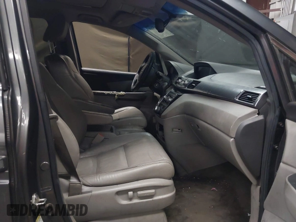 2012 Honda Odyssey Touring с VIN 5FNRL5H99CB047340, выставлен на аукционе IAAI как лот 41965189 с пробегом Не указан миль и . История ставок и продаж доступна на DreamBid. Изображение 5.