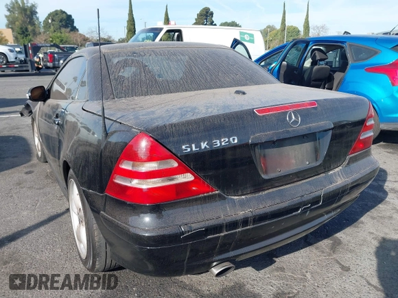 2003 Mercedes-Benz SLK 320 with VIN WDBKK65FX3F283784, listed as a IAAI auction lot 41152256 with 147,594 mi miles and . Bid and sale history available at DreamBid. Image 3.