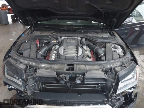 2012 Audi A8 with VIN WAUAVAFD9CN006499, listed as a IAAI auction lot 42461402 with 57,232 mi miles and . Bid and sale history available at DreamBid. Image 10.