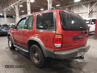 1999 Ford Explorer z VIN 1FMZU24E2XUA40849, wystawiony jako IAAI lot #41250506 z przebiegiem 174 706 mil mil oraz . Historia ofert i sprzedaży dostępna na DreamBid. Obrazek 3.