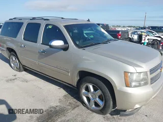 2013 Chevrolet Suburban LTZ with VIN 1GNSCKE01DR148980, listed as a IAAI auction lot 42163113 with 186,261 mi miles and . Bid and sale history available at DreamBid. Image 1.