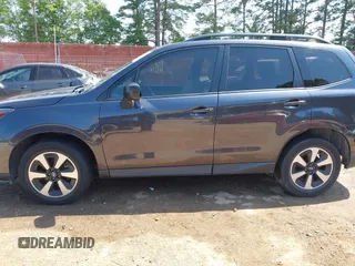 2018 Subaru Forester z VIN JF2SJABC9JH457297, wystawiony jako IAAI lot #42052293 z przebiegiem 94 058 mil mil oraz . Historia ofert i sprzedaży dostępna na DreamBid. Obrazek 14.