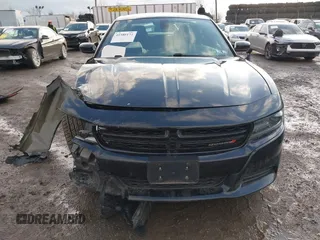 2019 Dodge Charger SXT with VIN 2C3CDXJG3KH630975, listed as a IAAI auction lot 41580174 with 74,575 mi miles and . Bid and sale history available at DreamBid. Image 12.