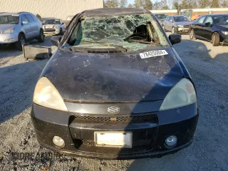 2004 Suzuki Aerio SX z VIN JS2RC61H945252026, wystawiony jako Copart lot #78425004 z przebiegiem 171 601 mil mil oraz Szkoda całkowita • Salvage title. Historia ofert i sprzedaży dostępna na DreamBid. Obrazek 5.