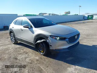 2023 Mazda CX-30 2.5 S Premium Package with VIN 3MVDMBDM5PM525771, listed as a IAAI auction lot 41476431 with 39,326 mi miles. Bid and sale history available at carsss.com. Image 1.