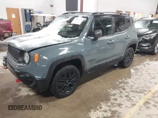 2017 Jeep Renegade Trailhawk z VIN ZACCJBCB4HPE86966, wystawiony jako IAAI lot #41502978 z przebiegiem 144 723 mil mil oraz . Historia ofert i sprzedaży dostępna na DreamBid. Obrazek 2.