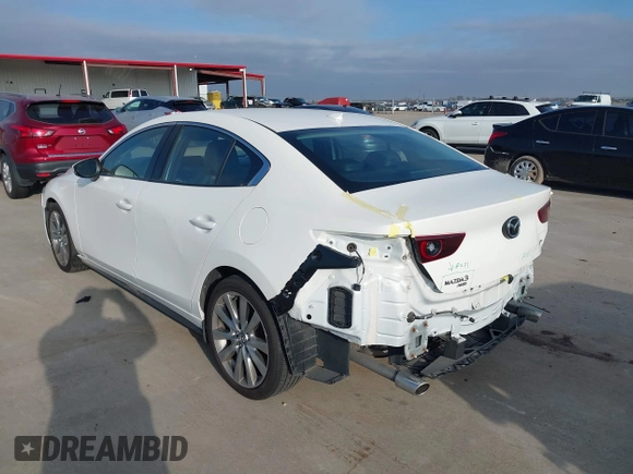 2023 Mazda 3 S Premium with VIN 3MZBPBDM7PM363574, listed as a IAAI auction lot 41585343 with 28,111 mi miles and . Bid and sale history available at DreamBid. Image 3.