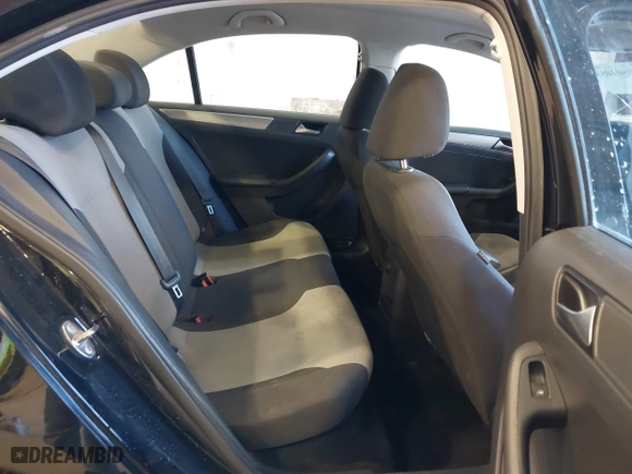 2017 Volkswagen Jetta 1.4T S with VIN 3VW167AJ5HM329706, listed as a IAAI auction lot 40801058 with 144,103 mi miles. Bid and sale history available at carsss.com. Image 8.