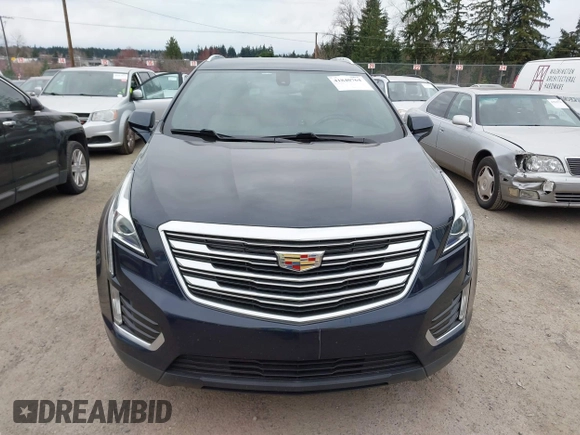 2017 Cadillac XT5 FWD with VIN 1GYKNARS2HZ188557, listed as a IAAI auction lot 41840764 with 104,524 mi miles. Bid and sale history available at carsss.com. Image 12.
